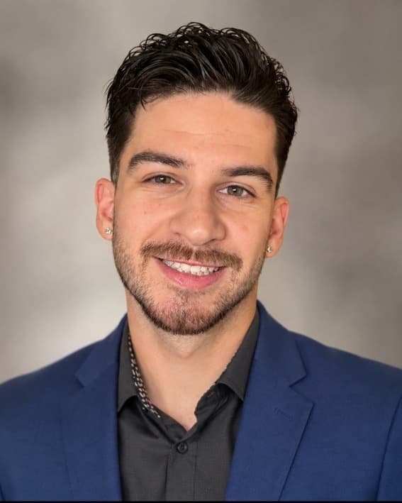 Marshall Buchner, founder of MDB Labs, in a navy blazer
